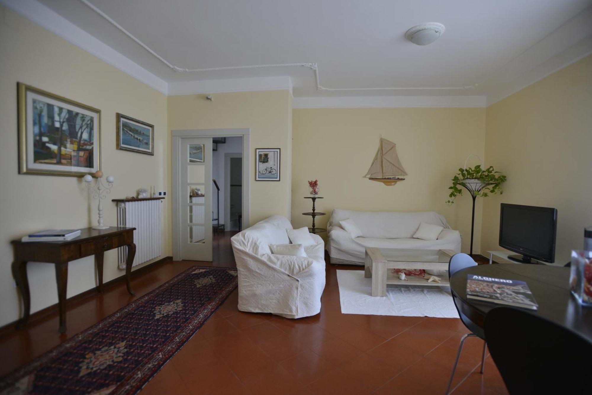 Apartamento Casa Alice Alguer Habitación foto